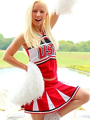 Busty blonde cheerleader with killer curves